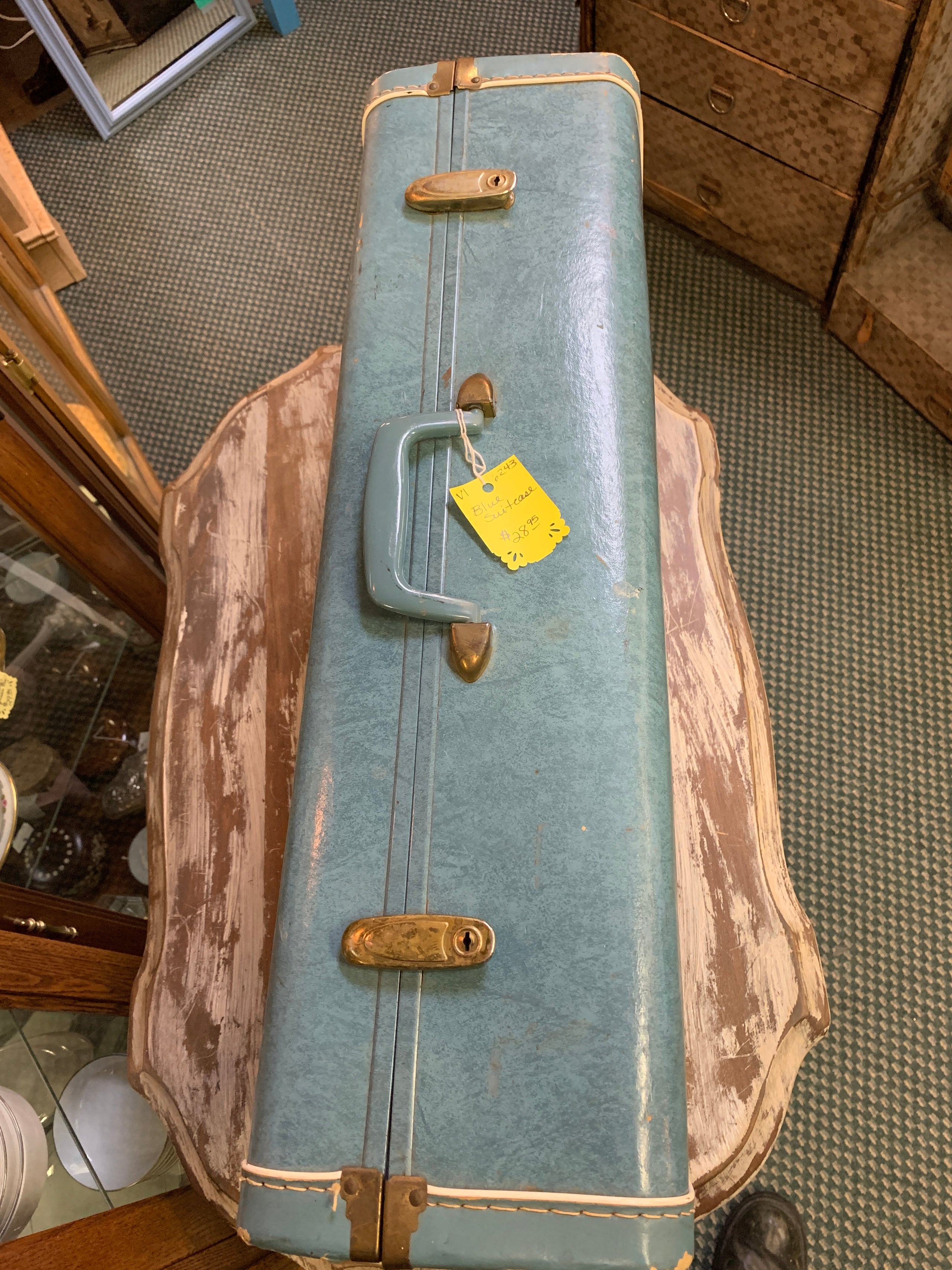 Vintage blue suitcase on sale